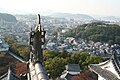 A mythical tiger-headed fish called shachi (鯱). This motif was used atop the castle towers as a talisman for fire prevention.[٤٢]