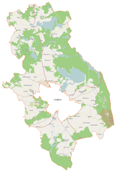 Mapa konturowa gminy wiejskiej Szczecinek, blisko centrum na prawo znajduje się owalna plamka nieco zaostrzona i wystająca na lewo w swoim dolnym rogu z opisem „Wielimie”