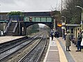 Hindley station view of two bridges and pipe from platform at distance for perspective