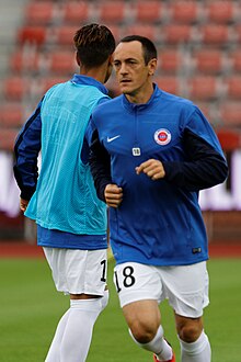 Photo de Laurent Dufresne, de trois-quart, en tenue de footballeur.