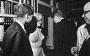 Robert F. Kennedy, Marilyn Monroe and John F. Kennedy at the president's early birthday party on May 19, 1962