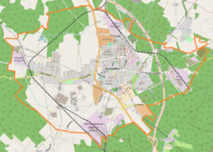 Mapa konturowa Polkowic, po prawej znajduje się punkt z opisem „'''Zakłady Górnicze „Rudna”'''”