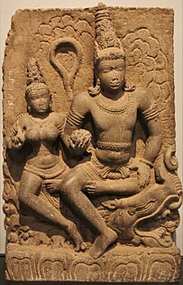 Varuna with Varunani. Statue made from Basalt and discovered in Karnataka (8th century CE)