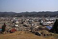 The tsunami swallowed up city areas and left behind many large ships.