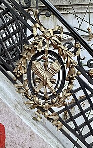 Neo-Louis XVI style medallion on a stair railing of the Nicolae T. Filitti/Nae Filitis House (Calea Dorobanților no. 18), Bucharest, by Ernest Doneaud, c.1910[15]