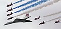 Image 29Concorde (and the Red Arrows with their trail of red, white and blue smoke) mark the Queen's Golden Jubilee. With its slender delta wings Concorde won the public vote for best British design. (from Culture of the United Kingdom)