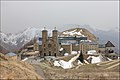 Le sanctuaire de Notre-Dame de La Salette, numériquement modifié pour représenter l'asile psychiatrique.