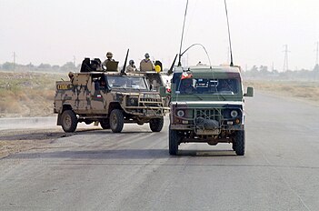 Honker Skorpion-3 and a ZWD-3 command vehicle based on a Honker in Iraq during the Second Persian Gulf War