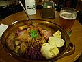 Image 46A "traditional Bohemian platter" at a restaurant in central Prague, consisting of roast duck, roast pork, beer sausage, smoked meat, red and white cabbage, bread, bacon and potato dumplings. (from Czech cuisine)