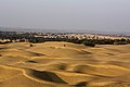 The Thar desert, 85% of which lies in the Indian state of Rajasthan, spreads over an area of 2,340,000 km2 (900,000 sq mi). It constitutes the northwestern limit of the southwest monsoon.[4]