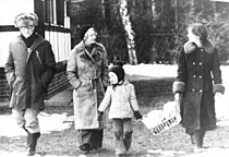 Erich Honecker and his wife take a walk with their daughter Sonja and grandson Roberto around the Waldsiedlung in 1977.