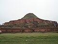 Image 31alt=Ruins of a structure of red stone now resembling a small hill or mound. (from Culture of Bangladesh)