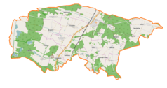 Mapa konturowa gminy Cieszków, blisko centrum na prawo znajduje się punkt z opisem „Pałac w Trzebicku”