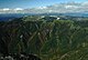 小秀山方面から望む白草山、前衛の山は三国山（1,611m）、その下部の谷は白川（加子母川）の上流部、周辺はヒノキなどの林業が盛んな山域（2002年10月30日）