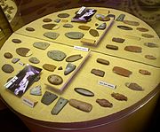 Carved shell gorgets and atlatl weights, Poverty Point