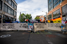 Barricaded street with banners