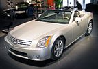 Cadillac XLR circa 2007, with aluminum hardtop concealed by tonneau cover