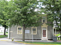 Front elevation of a two-story wooden house along South High Street in Romney