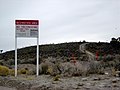 Photograph of an Area 51 warning sign specifically forbidding photography. You lose, US Government.