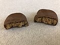 A Reese's Peanut Butter Pumpkin split in half