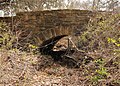 The CCC built many culverts and bridges while constructing Park Road 10, which winds up a hill to the recreation hall.