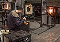 Image 66Glass blower. This was moments before he accidentally dropped it. Heartbreaking (and vasebreaking). Talented folks here, though, and I actually went back a while later and took a class. Got a piece of lit up frozen spaghetti to prove it.