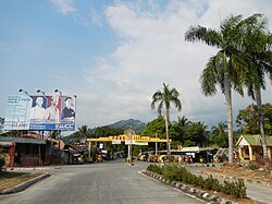 Overlooking Pugo town center and welcome arch from the National Highway