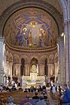 Interiören: absiden med Kristus-mosaiken i halvkupolen.