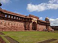 The 16th century Jahangiri Mahal at the Agra Fort has a four-centred arched gateway flanked by four-centred blind arches.