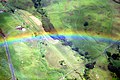 A view of a rainbow from a helicopter