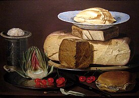 Nature morte avec le même plat en porcelaine, maintenant placé sous les volutes de beurre