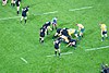 The All Blacks playing the Wallabies.