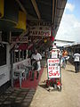 Image 58Butcher in the Central Market in Paramaribo with signs written in Dutch (from Suriname)