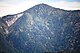白草山から望む小秀山、山頂部に避難小屋（2014年10月11日）