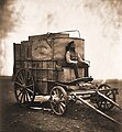 Image 42Roger Fenton's Photographic Van, 1855, formerly a wine merchant's wagon; his assistant is pictured at the front. (from Photojournalism)