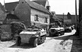 Бронетранспортер Sd.Kfz. 250/5 на чолі колони з 4-х 15 cm Панцерверфер 42. Франція. Червень 1944