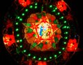 An electric parol embellished with various hues of lights.