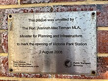 Metal plaque on brick wall
