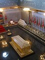 Interior of the mausoleum with a Quran reader