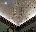 Ceiling engraving in the chamber of the New York City Council. Note the many deviations from the official seal design.