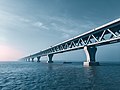 Image 36The Padma Multipurpose Bridge is a multipurpose road-rail bridge across the Padma River, the main distributary of Ganges, under construction in Bangladesh. The image features a beautiful morning view of Padma Bridge under construction (November 2021). Photo Credit: Nahian Bin Shafiq