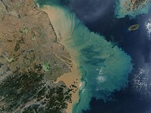 Desembocadura. Aportació de sediments al mar. Jiangsu (Xina)