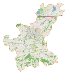 Mapa konturowa gminy Wieliczka, w centrum znajduje się punkt z opisem „Cmentarz Komunalny w Wieliczce”