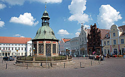 Market Square with the waterworks from 1602 (Wasserkunst), landmark of Wismar