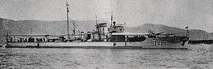 a black and white image of a ship underway