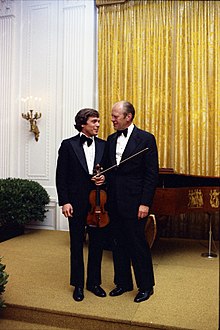 Fodor (left) with President Gerald Ford in 1974.