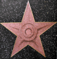 Pentru munca ta continuă în dezvoltarea subiectelor legate de cinematografie aici pe Wikipedia, XXN îți oferă această stea pe Hollywood Walk of Fame :)