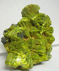 Autunite, from Washington State, U.S.A. Photo by Rob Lavinsky, iRocks.com – CC-BY-SA-3.0.