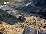 Terril de Saint Antoine démantelé en vue de récupérer le charbon et abandonné à son sort après la faillite de l'entreprise qui effectuait les travaux.