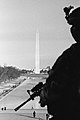 Image 11Black-and-white photograph of a National Guardsman looking over the Washington Monument in Washington D.C., on January 21, 2021, the day after the inauguration of Joe Biden as the 46th president of the United States (from Photojournalism)